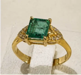 Emerald Solitaire Ring — angle
